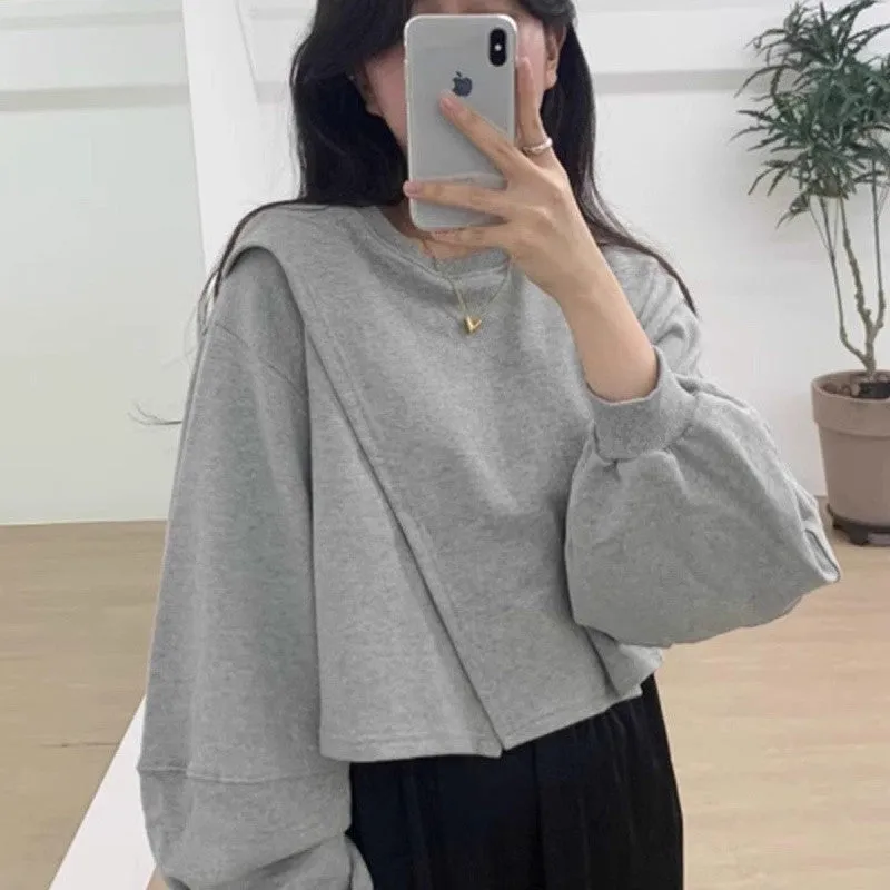 METAVERSMALL Korean chic autumn niche design sense pullover round neck irregular split fork loose versatile long-sleeved short sweater